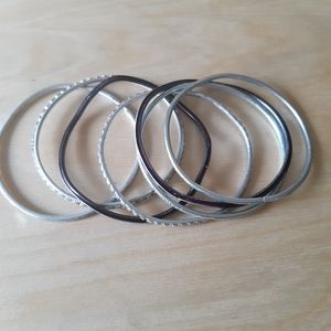 Silver and black bangle bracelets
